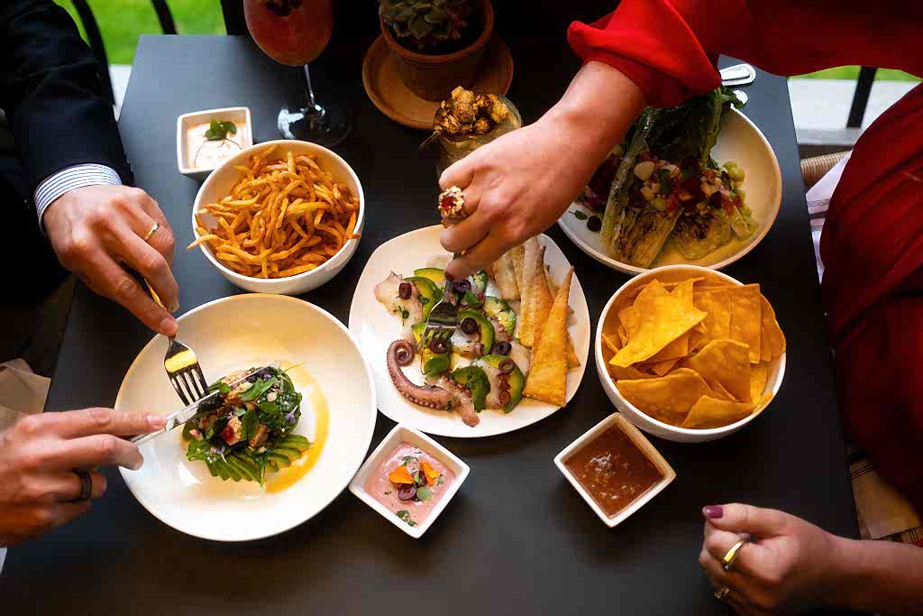Hands grabbing food